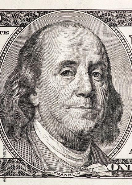 Fototapeta Close-up portrait of Benjamin Franklin in front of the one hundr
