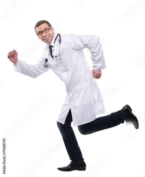 Fototapeta Smiling medical doctor running to his patients. Isolated over wh