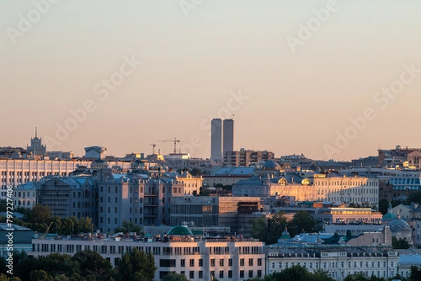 Fototapeta View of residential and office buildings in the center of the Russian capital in the early summer morning.