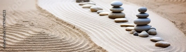 Fototapeta a row of stones in sand