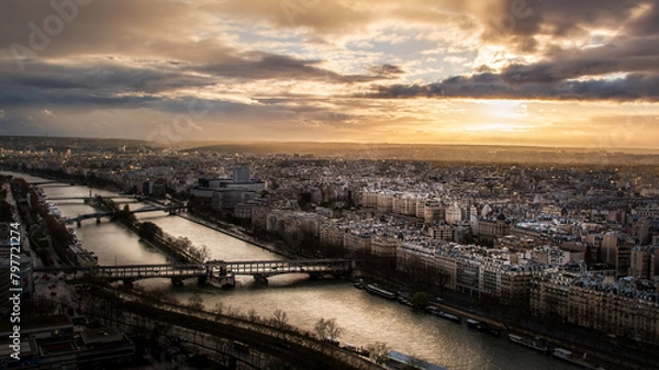 Obraz View over the river seine at sunset. Wide angle landscape photo of the city of Paris