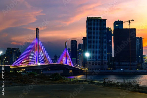 Obraz Night city and bridge with sun set