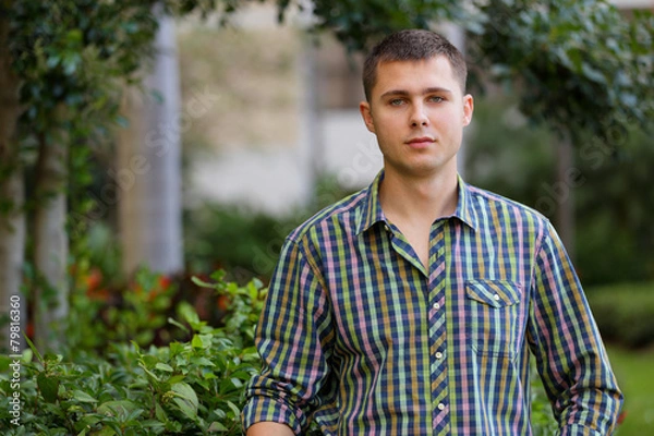 Obraz Man posing in the garden