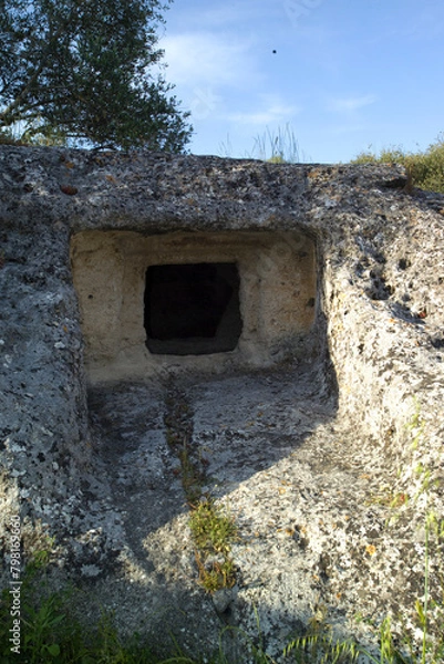 Fototapeta  the ancient necropolis of 'Puttu Codinu' with the subterranean graves 'Domus de Janas' near the reservoir 'Lago di Temo' in the north west of Sardinia, Villanova Monteleone, Alghero,Italy
