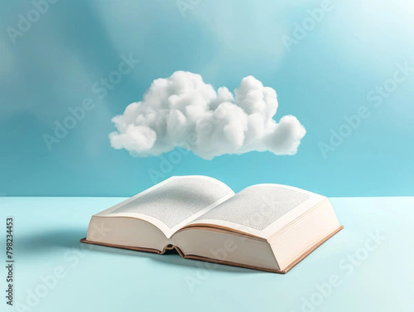 Fototapeta An open book with a cloud above it. The cloud is white and fluffy