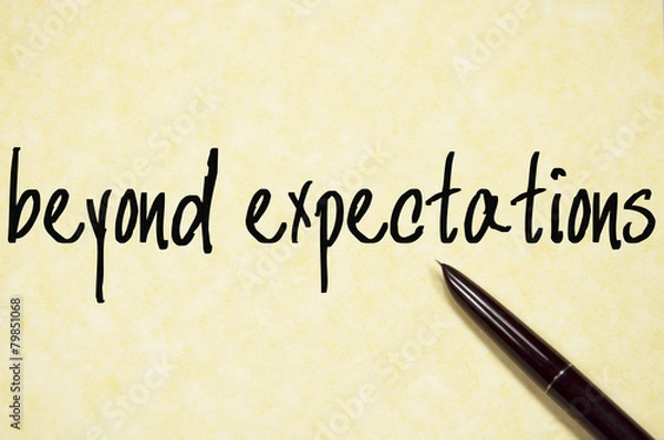 Fototapeta beyond expectations text write on paper
