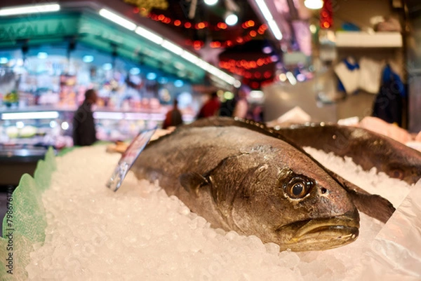 Fototapeta Fish for sale at the local retail market. Fresh fish in a supermarket. Fresh fish at the market, displayed on ice