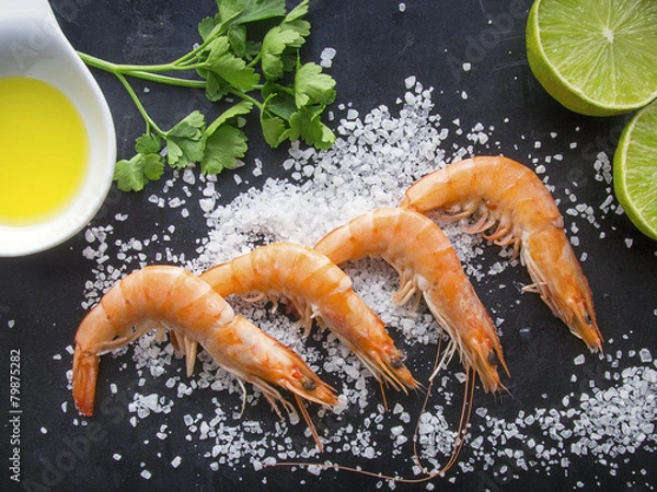 Fototapeta Shrimps on dark background