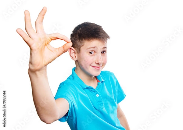 Fototapeta Portrait of a boy pointing finger showing  expressive emotions