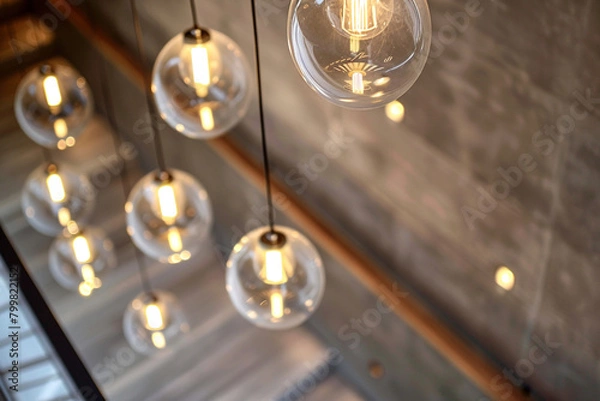 Fototapeta Series of Italian light fixtures across a retail space enhancing shopping experience.