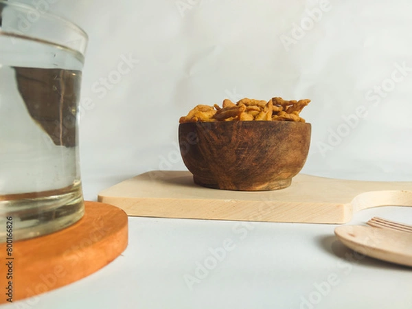 Obraz photography of cimi-cimi snacks with a glass of water