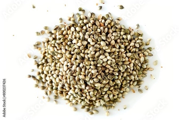 Fototapeta Heap of shelled hemp seeds on white background from above