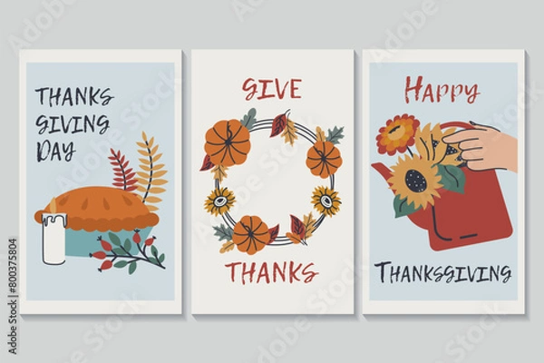 Fototapeta Happy Thanksgiving day set of posters in flat cartoon design. The three posters feature Thanksgiving decorations, such as a pie, a leaf wreath, and a bouquet of fall flowers. Vector illustration.