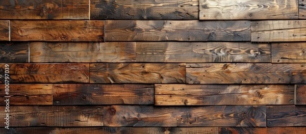 Fototapeta Detailed view of a solid wooden wall featuring an abundance of individual planks creating a rustic and textured surface