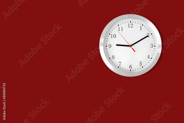 Fototapeta classic clock on red background with copy-space