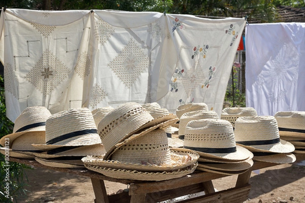 Obraz Straw hats on street stall in Trinidad