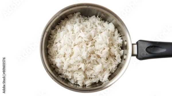 Obraz Top view shot capturing rice in a pan.