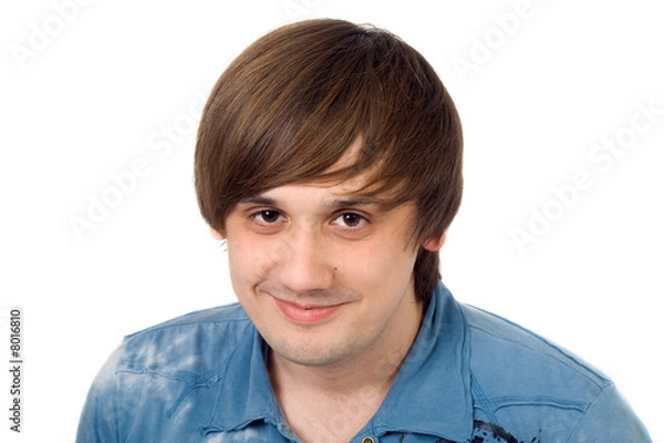 Fototapeta Portrait of  the smiling young man. Isolated.