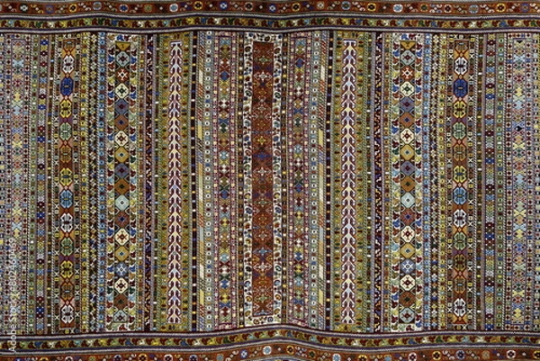 Fototapeta carpet with a colorful pattern in silk thread