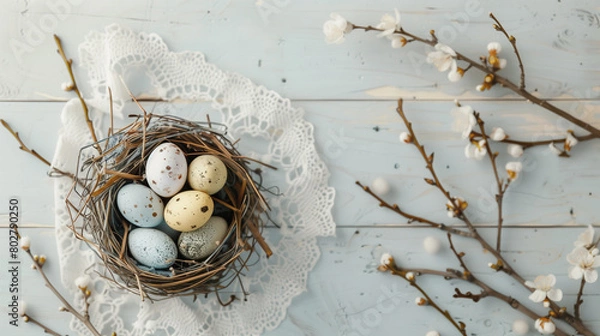 Fototapeta eggs in the snow and yellow red pink blue sky egg in next white flower