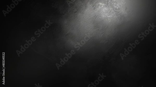 Fototapeta An atmospheric black gradient background, subtly textured with grain and noise, designed for use as a blurred dark header or backdrop in creative projects