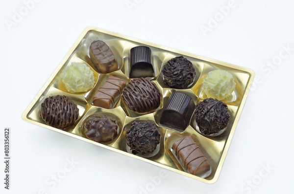 Fototapeta Box of Chocolates, close up, isolated on white Background