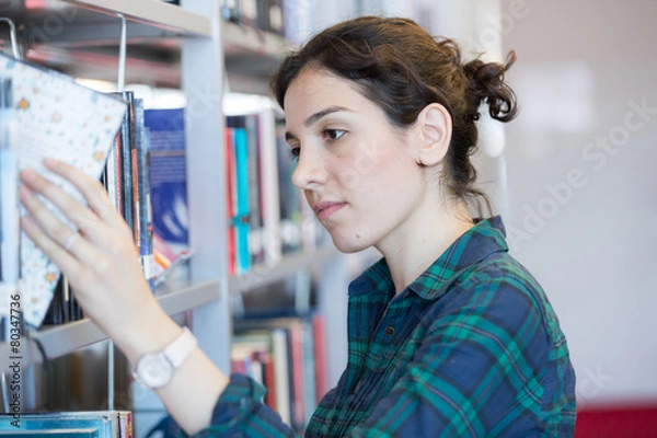 Obraz Searching for a Book at Library