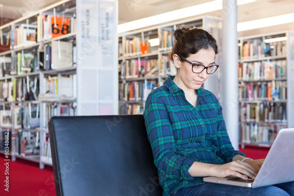 Obraz Studying on a Laptop at Library