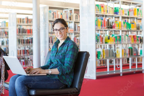 Obraz Studying on a Laptop at Library