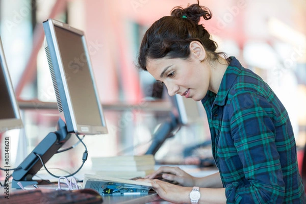 Obraz Reading at Computer Desk
