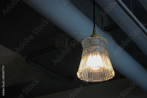 Obraz hanging light and concrete ceiling with pipe exposed