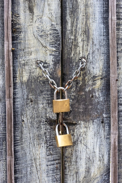Obraz wooden texture door and padlocks