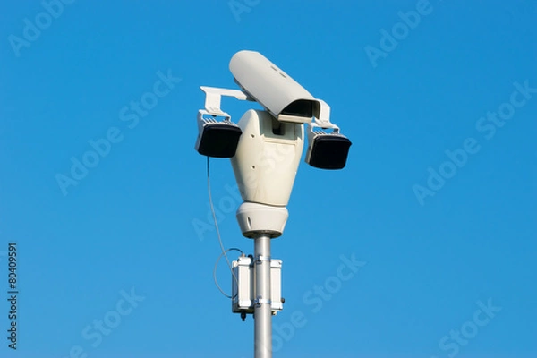 Fototapeta Surveillance Camera and Blue Sky