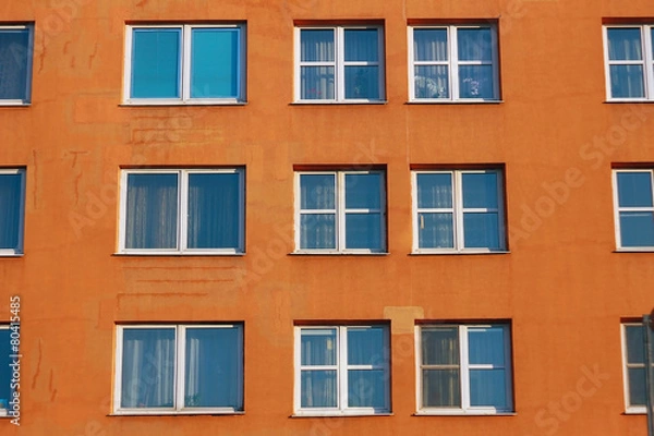 Fototapeta Желтая стена дома с окнами текстура