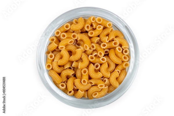 Fototapeta A glass full of rigati macaroni pasta