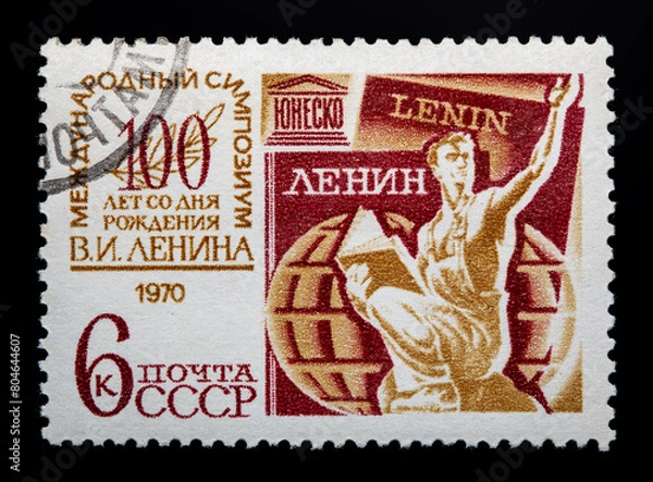Fototapeta A stamp printed in the USSR devoted International Symposium on 100 years since the birth of Lenin, circa 1970
