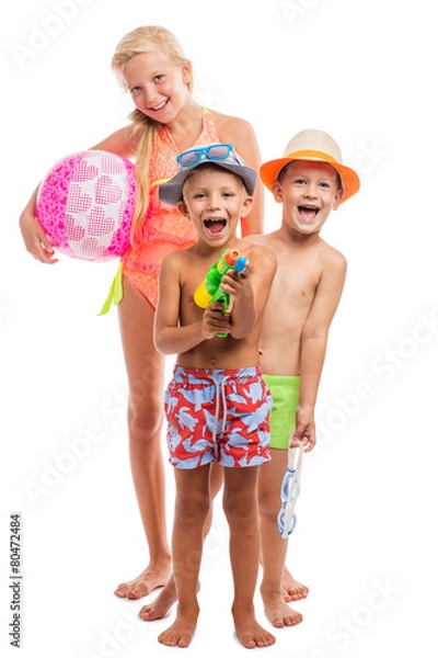 Obraz Three happy kids in a swimsuit standing together, isolated on wh