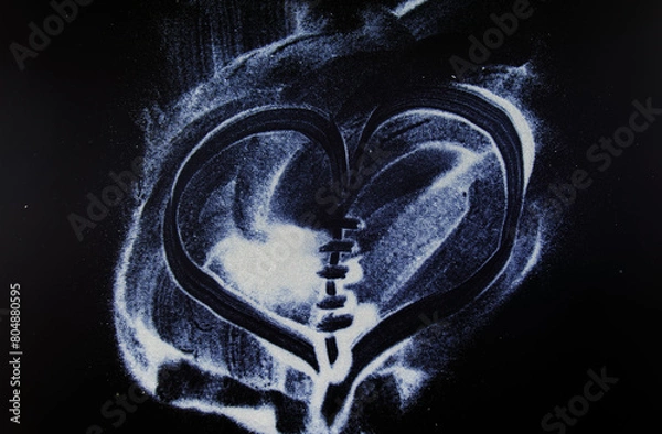 Obraz abstract white dust on a black background.