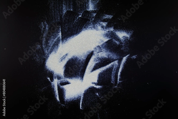 Obraz abstract white dust on a black background.