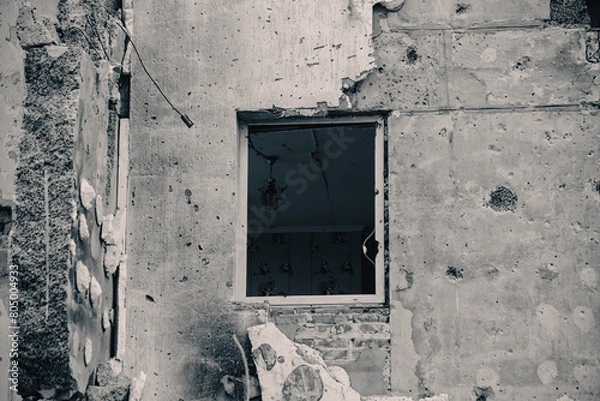 Obraz destroyed and burned houses in the city during the war in Ukraine