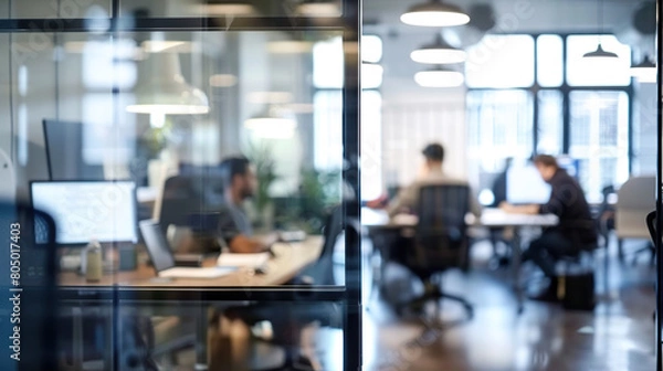Fototapeta Bright business workplace with people in walking in blurred motion in modern office space