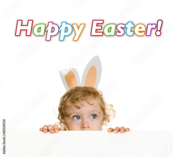 Obraz Cute child with easter rabbit ears looking over the table edge