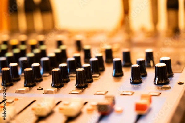 Fototapeta Hi-Fi system console control panel audio equipment Close-up of digital studio mixer control panel Use blurring techniques