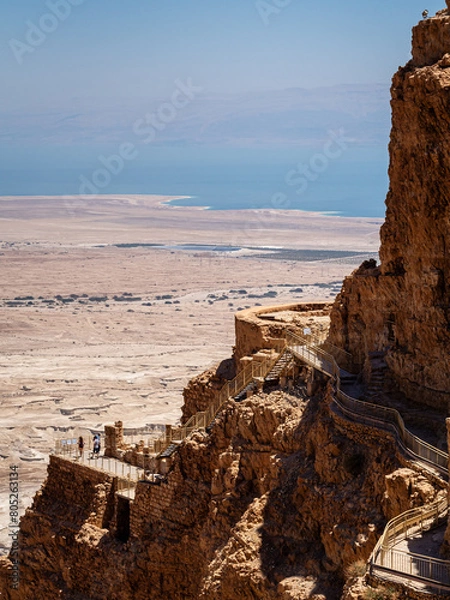 Fototapeta Historical site of Masada over the Judean desert and the dead sea