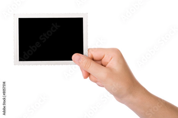 Fototapeta Dłoń trzymająca zdjęcie na białym tle na białym tle