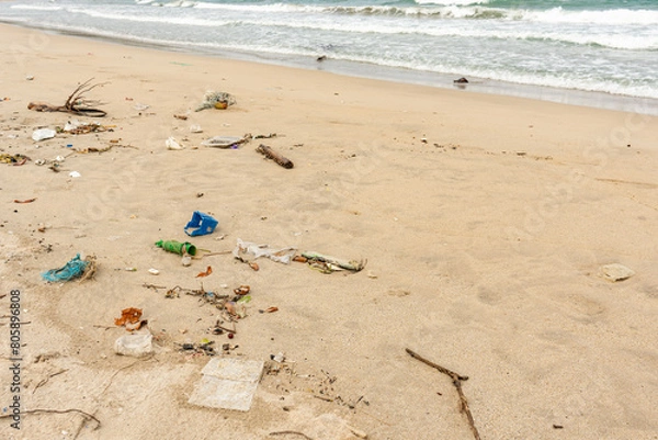 Fototapeta Sri Lanka, Bottles of plastic and garbage on the sand on the beach near the ocean, sea pollution catastrophe.