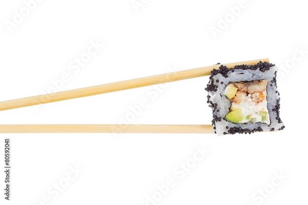 Fototapeta Sushi roll with chopsticks isolated on white