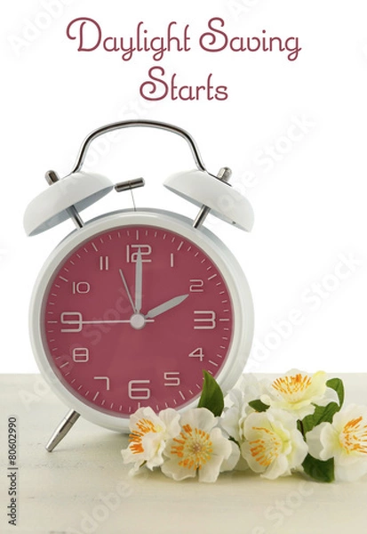Obraz Daylight Saving Time concept alarm clock