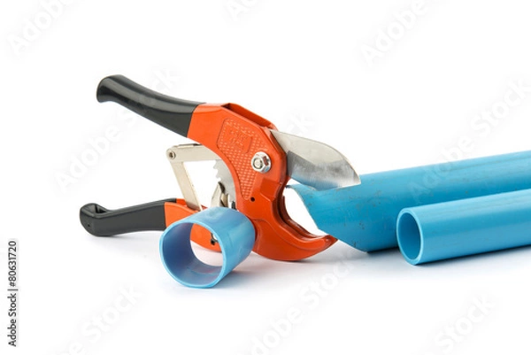 Fototapeta Tools for cutting pvc pipe isolated on white background