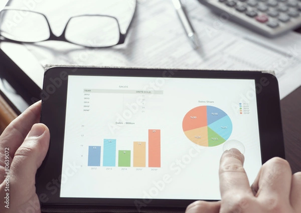 Fototapeta Businessman checking statistics